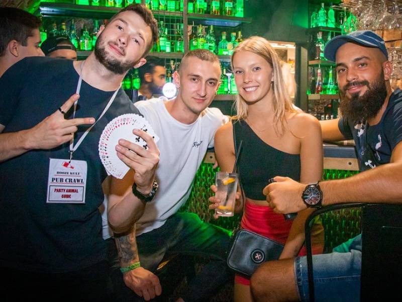 image showing 4 people having fun in a krakow bar 