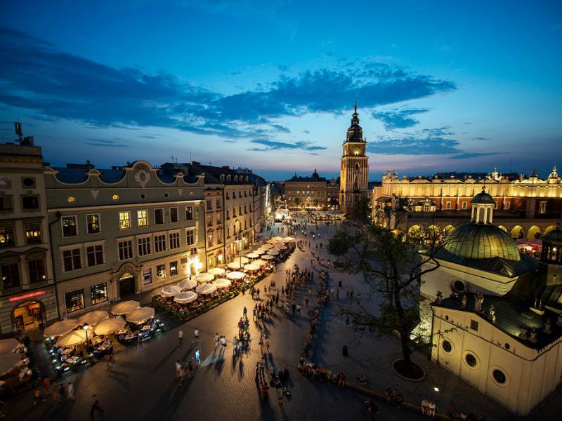 view of Krakow MArket Square at dusk