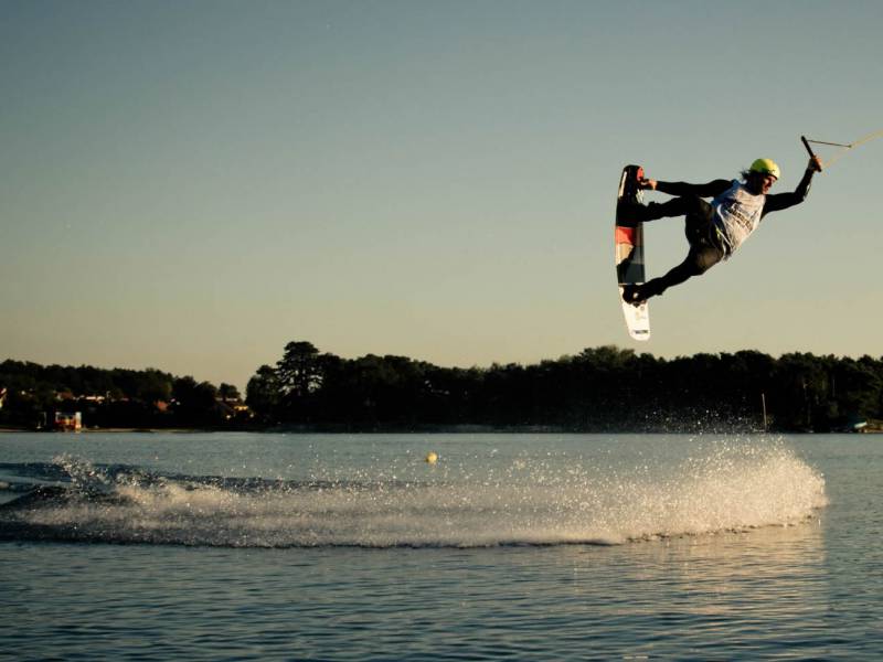 a man doing water-boarding in Kryspinow lake