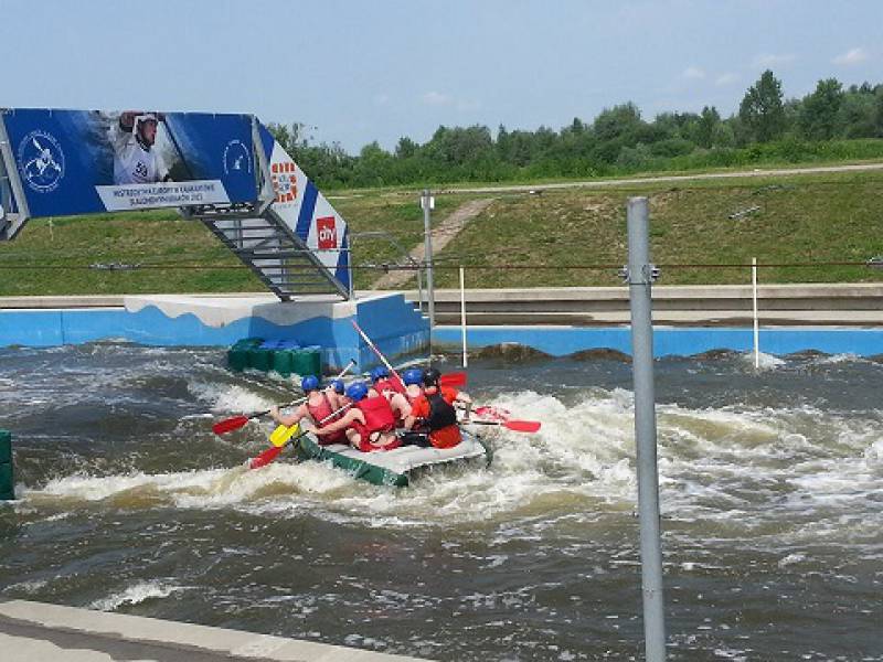 a group of stags on a pontoon during white water rafting activity