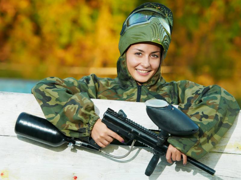 girl playing paintball