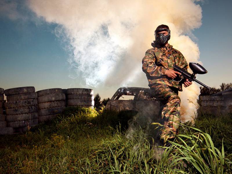 man playing paintball